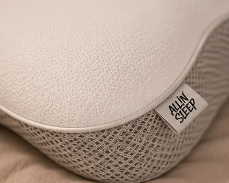 Close-up of the ALLIN SLEEP pillow's fabric cover and mesh side panel